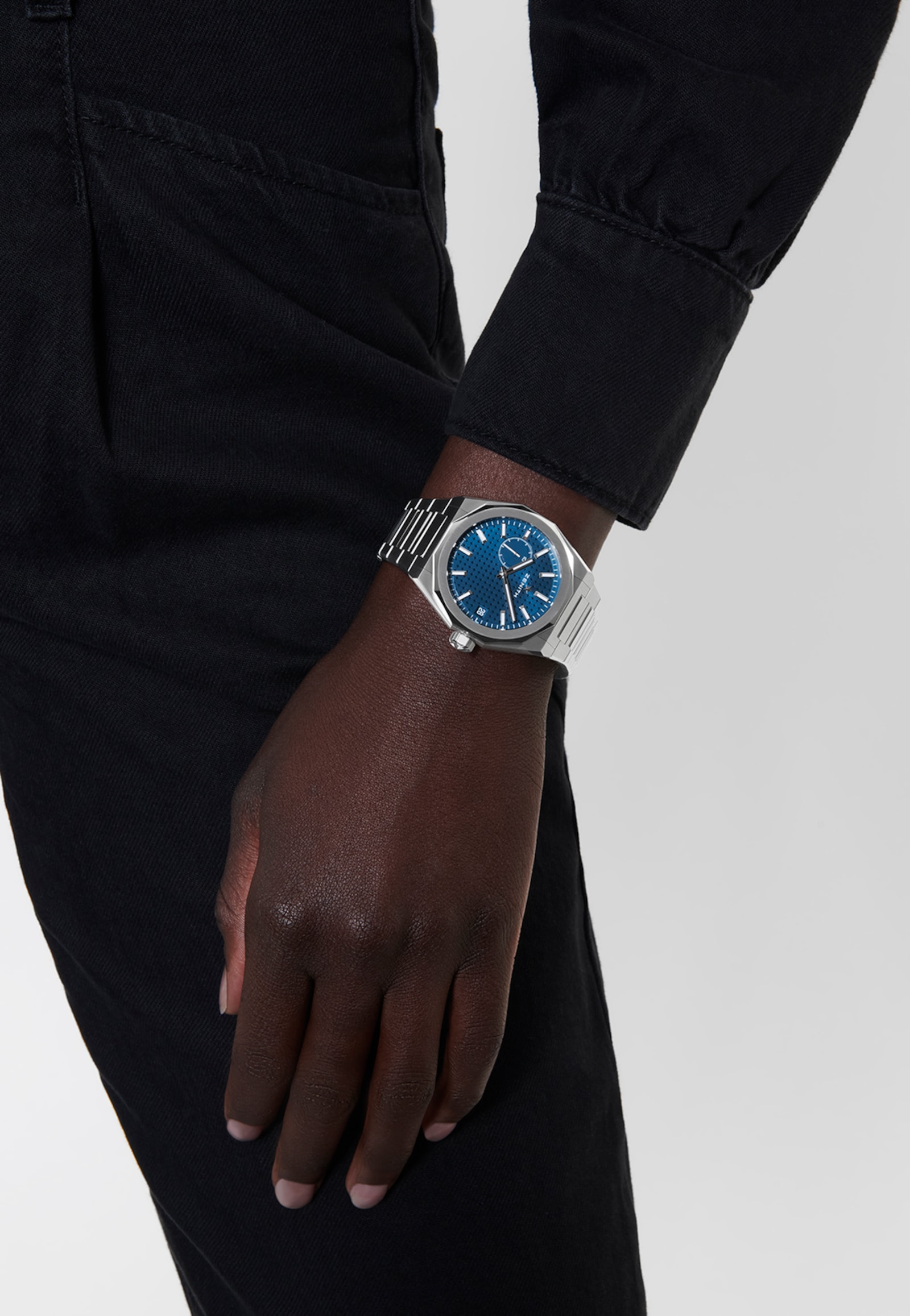 Blue Zenith DEFY Skyline worn with a dark knit top.